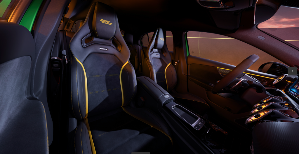 Mercedes-AMG A 45 interior View, image credits - Mercedes Benz The AMG door sills showcase meticulous attention to detail, displaying an AMG pattern design in black and illuminating the AMG logo in yellow